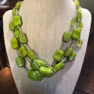 Triple stranded green glass beaded necklace